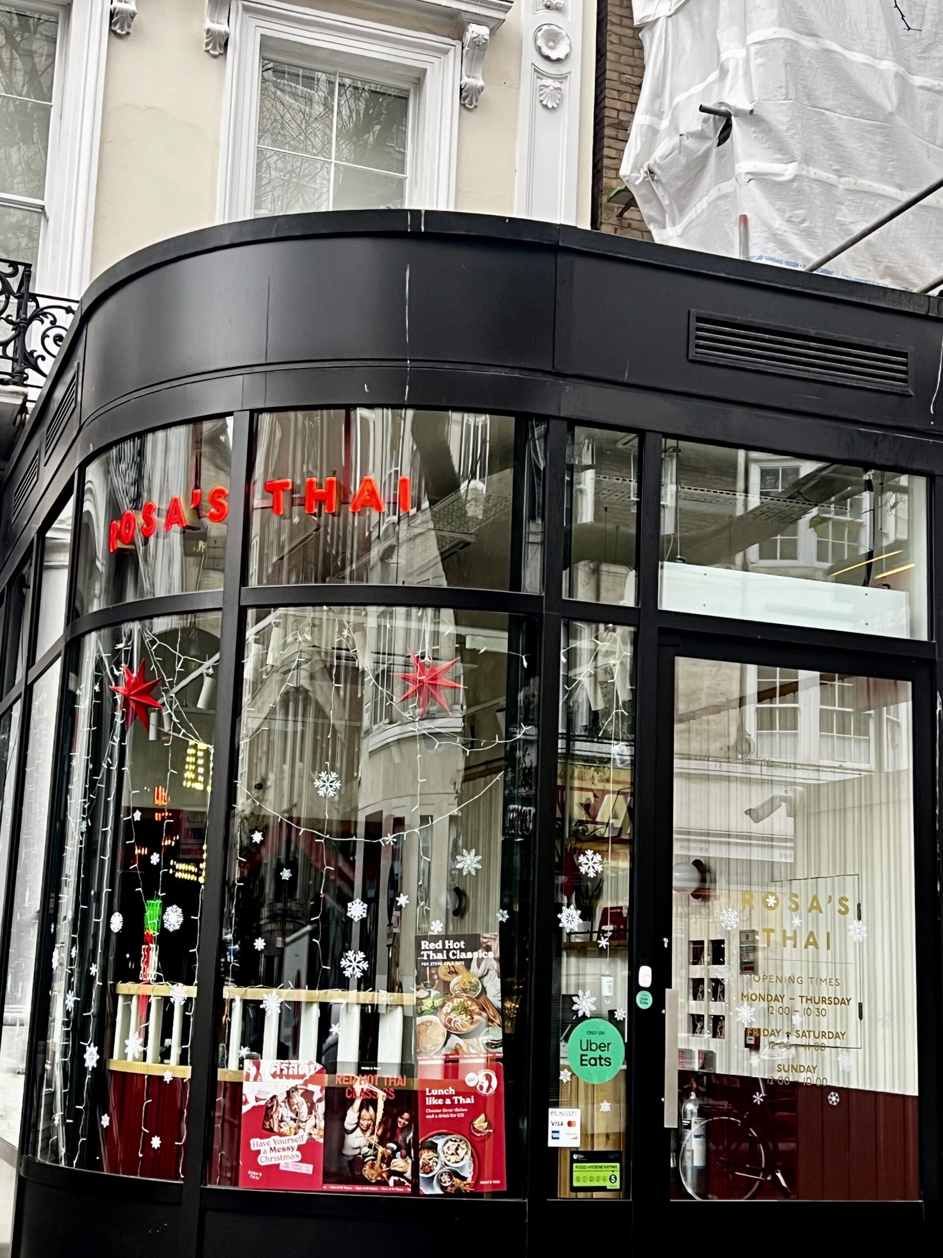 Finished retail unit at 36–38 Queensway with curved glass façade and newly built extension Westmasters project